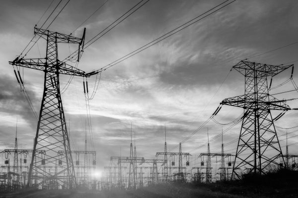 Electrical substation silhouette on the dramatic sunset background